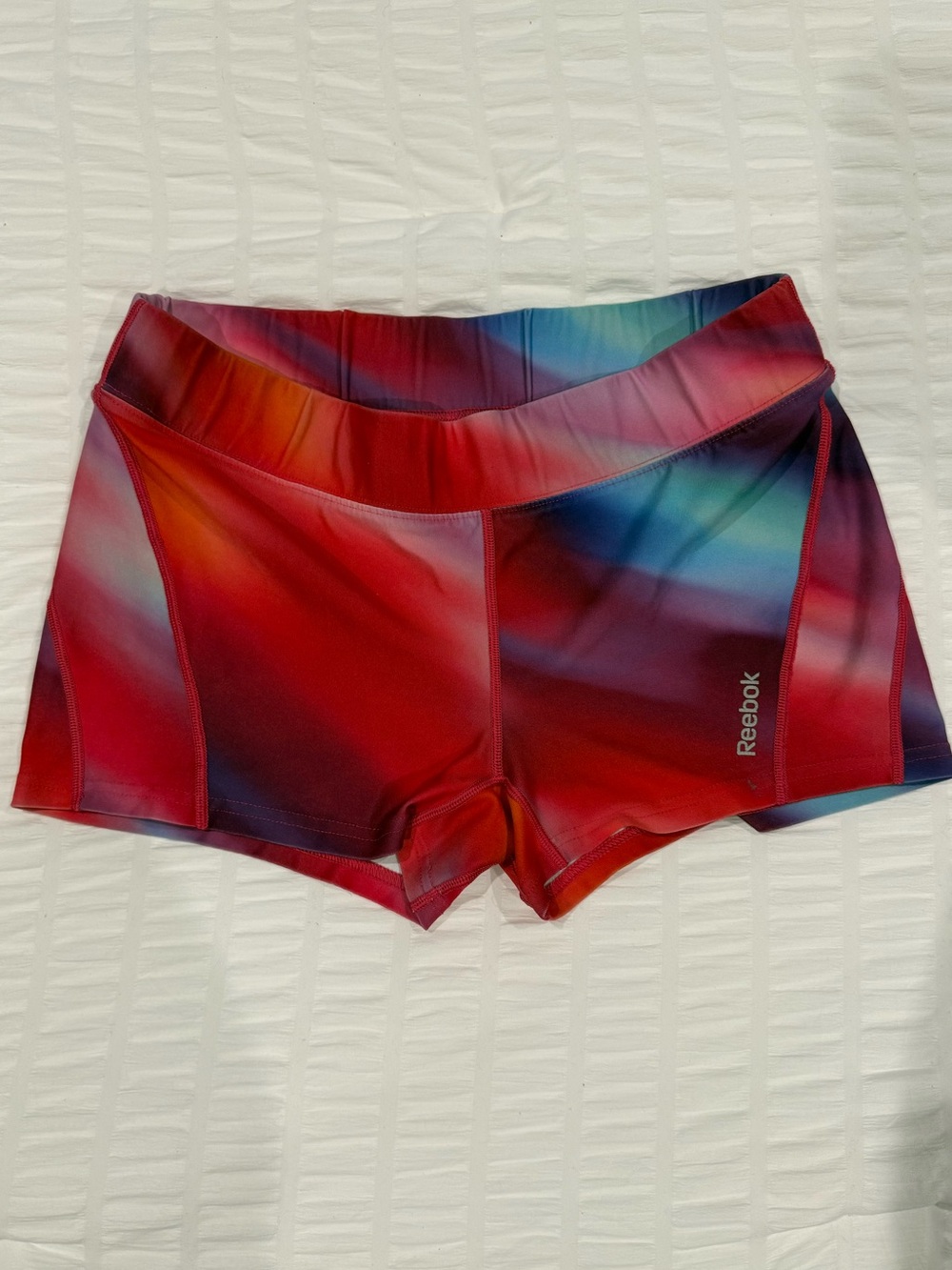 Reebok Women’s Red & Blue Gradient Athletic Shorts